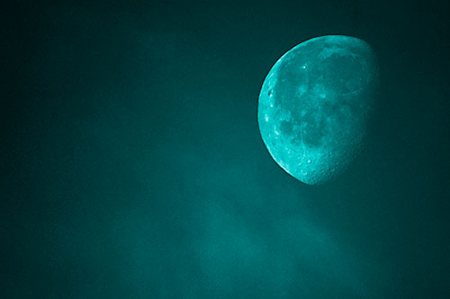 Moon Creeping Along Faint Cloud Mass (Cyan Shade Photo)