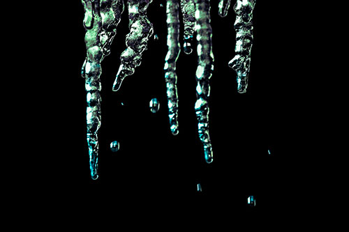 Jagged Melting Icicles Dripping Water (Cyan Tint Photo)