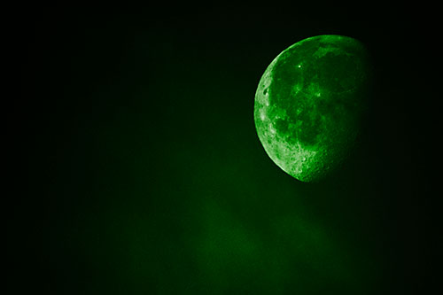 Moon Creeping Along Faint Cloud Mass (Green Tone Photo)
