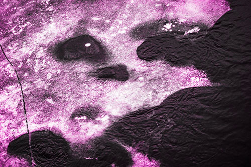 Disintegrating Ice Face Melting Among Flowing River Water (Pink Tone Photo)