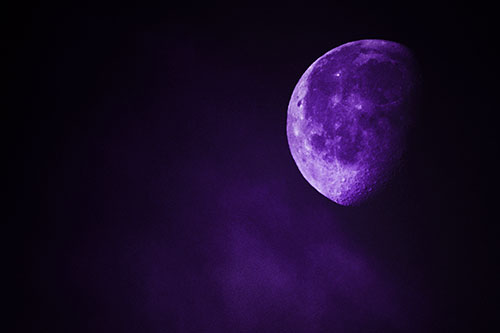 Moon Creeping Along Faint Cloud Mass (Purple Tint Photo)
