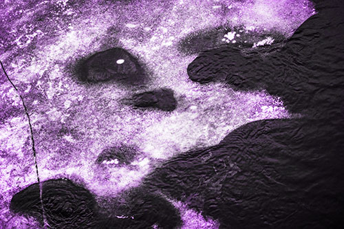 Disintegrating Ice Face Melting Among Flowing River Water (Purple Tone Photo)