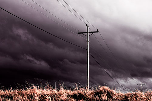 Dark Thunderstorm Clouds Over Powerline (Red Tint Photo)