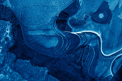 Angry Fuming Frozen River Ice Face (Blue Shade Photo)