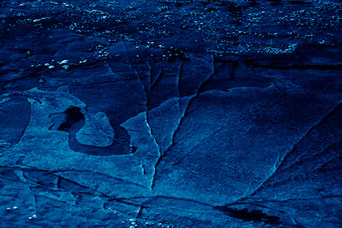 Bubble Cracking River Ice (Blue Shade Photo)
