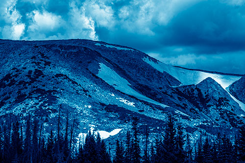 Clouds Cover Melted Snowy Mountain Range (Blue Shade)