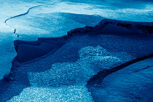 Cracked Ice Frozen Shoreline Melting (Blue Shade Photo)