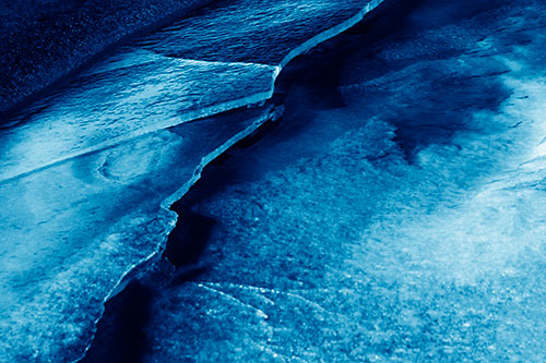 Cracking Blood Frozen Ice River (Blue Shade Photo)