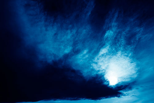 Dark Cloud Mass Holding Sun (Blue Shade Photo)