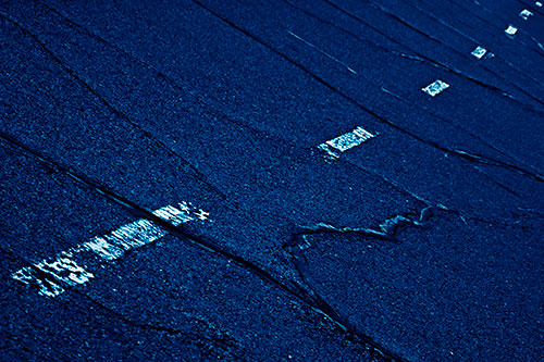 Decomposing Pavement Markings Along Sidewalk (Blue Shade Photo)