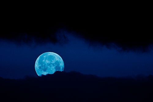 Easter Morning Moon Peeking Through Clouds (Blue Shade Photo)