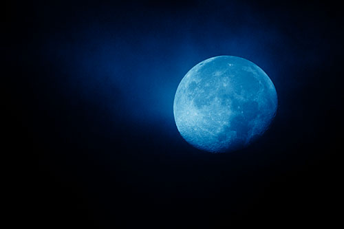 Fireball Moon Setting After Sunrise (Blue Shade Photo)