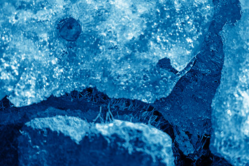 Ice Melting Crevice Mouthed Rock Face (Blue Shade Photo)
