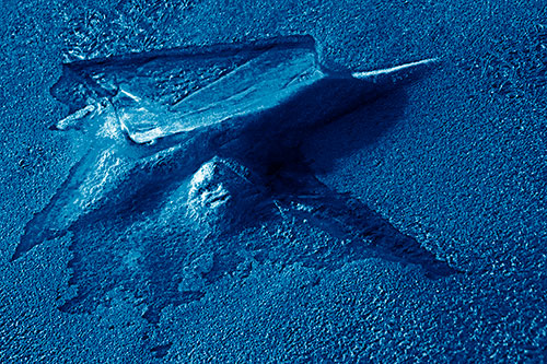 Jagged Melting River Ice Submerging (Blue Shade Photo)