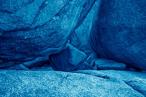Large Crowded Boulders Leaning Against One Another (Blue Shade Photo)
