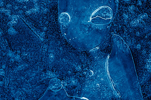 Mouthless Alien Ice Figure Forms Among Frozen River Water (Blue Shade Photo)
