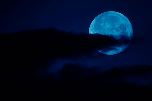 Pac Man Moon Swallows Clouds (Blue Shade Photo)