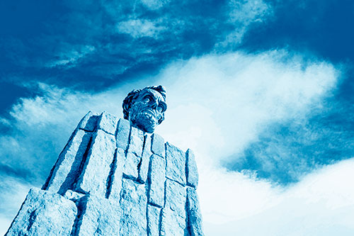 Presidents Statue Standing Tall Among Clouds (Blue Shade Photo)