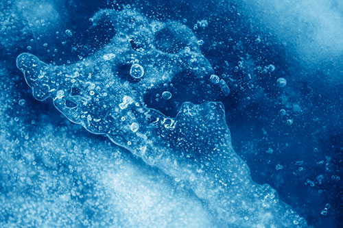 Screaming Submerged Bubble Face Creature Among Icy River (Blue Shade)