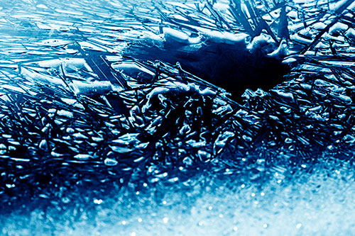 Shattered Ice Crystals Surround Water Hole (Blue Shade Photo)