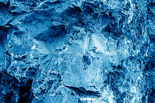 Shut Eyed Rock Face Decomposing (Blue Shade Photo)