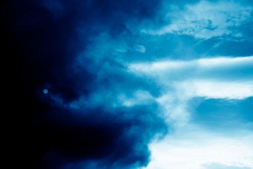 Sun Spiraling Out Of Mullen Fire Clouds (Blue Shade Photo)