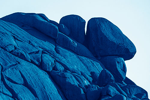 Sunlight Casting Shadows On Mountain Of Rocks (Blue Shade)