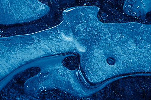 Swirling Frozen Smiling Bubble Eyed River Ice Face (Blue Shade)