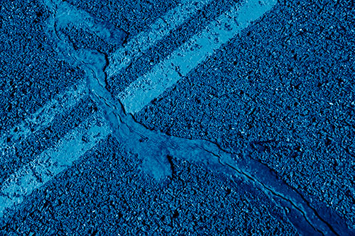 Tar Creeping Over Sidewalk Pavement Lane Marks (Blue Shade Photo)