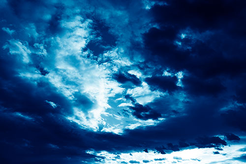 Thick Dark Cloud Refuses To Split In Half (Blue Shade Photo)