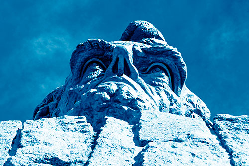 Vertical Upwards View Of Presidents Statue Head (Blue Shade Photo)