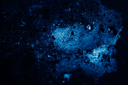 Wide Eyed Oil Demon Face Floating Atop Water (Blue Shade)