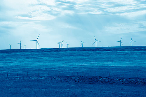 Wind Turbines Scattered Along Prairie Horizon (Blue Shade)