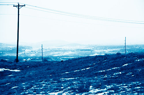 Winter Snowstorm Approaching Powerlines (Blue Shade Photo)