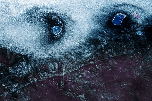 Bubble Eyed Smirk Cracking River Ice Face (Blue Tint Photo)