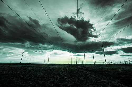 Creature Cloud Formation Above Powerlines (Blue Tint Photo)