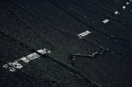 Decomposing Pavement Markings Along Sidewalk (Blue Tint Photo)