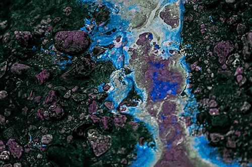 Distorted Oil Face Smearing Among Rocky Shore (Blue Tint)
