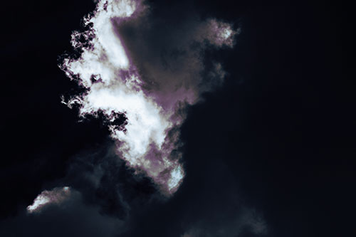 Evil Cloud Face Snarls Among Sky (Blue Tint Photo)