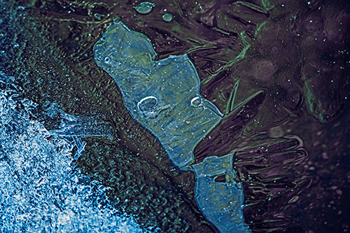 Frozen Bubble Eyed Ice Face Figure Along River Shoreline (Blue Tint)