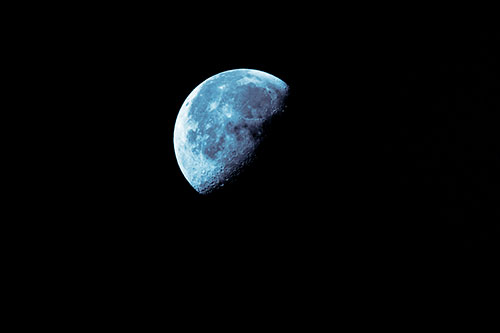 Half Blue Moon During Morning Orbit (Blue Tint Photo)