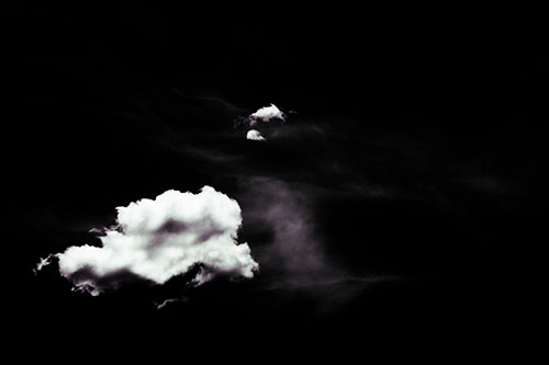 Isolated Creature Head Cloud Appears Within Darkness (Blue Tint Photo)