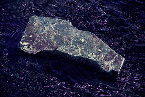 Massive Rock Atop Riverbed (Blue Tint Photo)