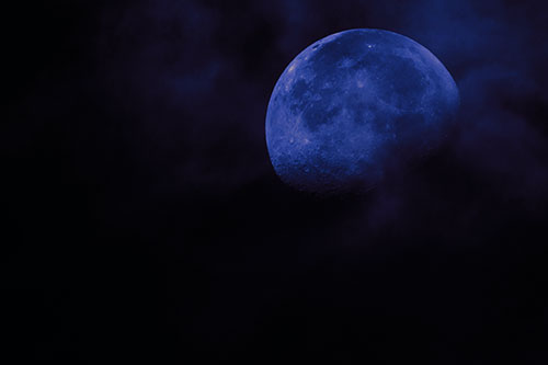 Moon Descending Among Faint Clouds (Blue Tint Photo)