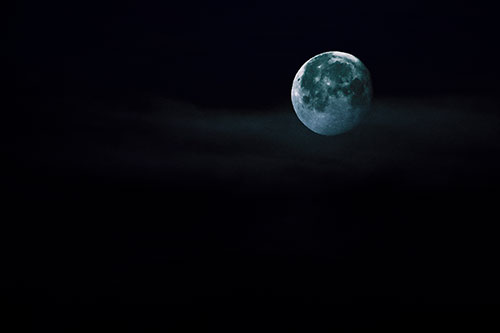 Moon Sets Behind Faint Clouds (Blue Tint Photo)