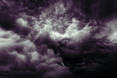 Raging Thunderstorm Clouds Brewing Among Sky (Blue Tint)