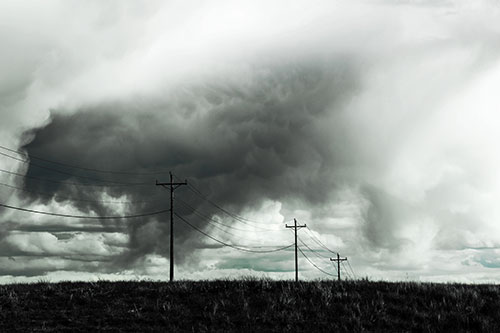 Rainstorm Clouds Twirl Beyond Powerlines (Blue Tint Photo)