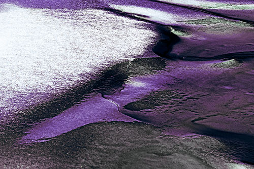 Sloping Ice Melting Atop River Water (Blue Tint Photo)