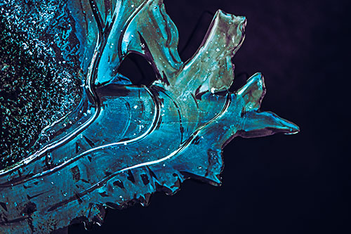 Smooth Ice Face Creature Hanging Above River Shoreline (Blue Tint)