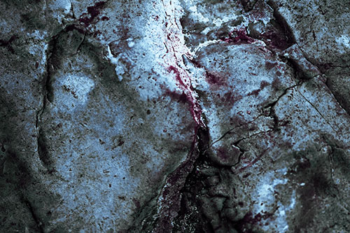 Stained Blood Splatter Rock Surface (Blue Tint Photo)
